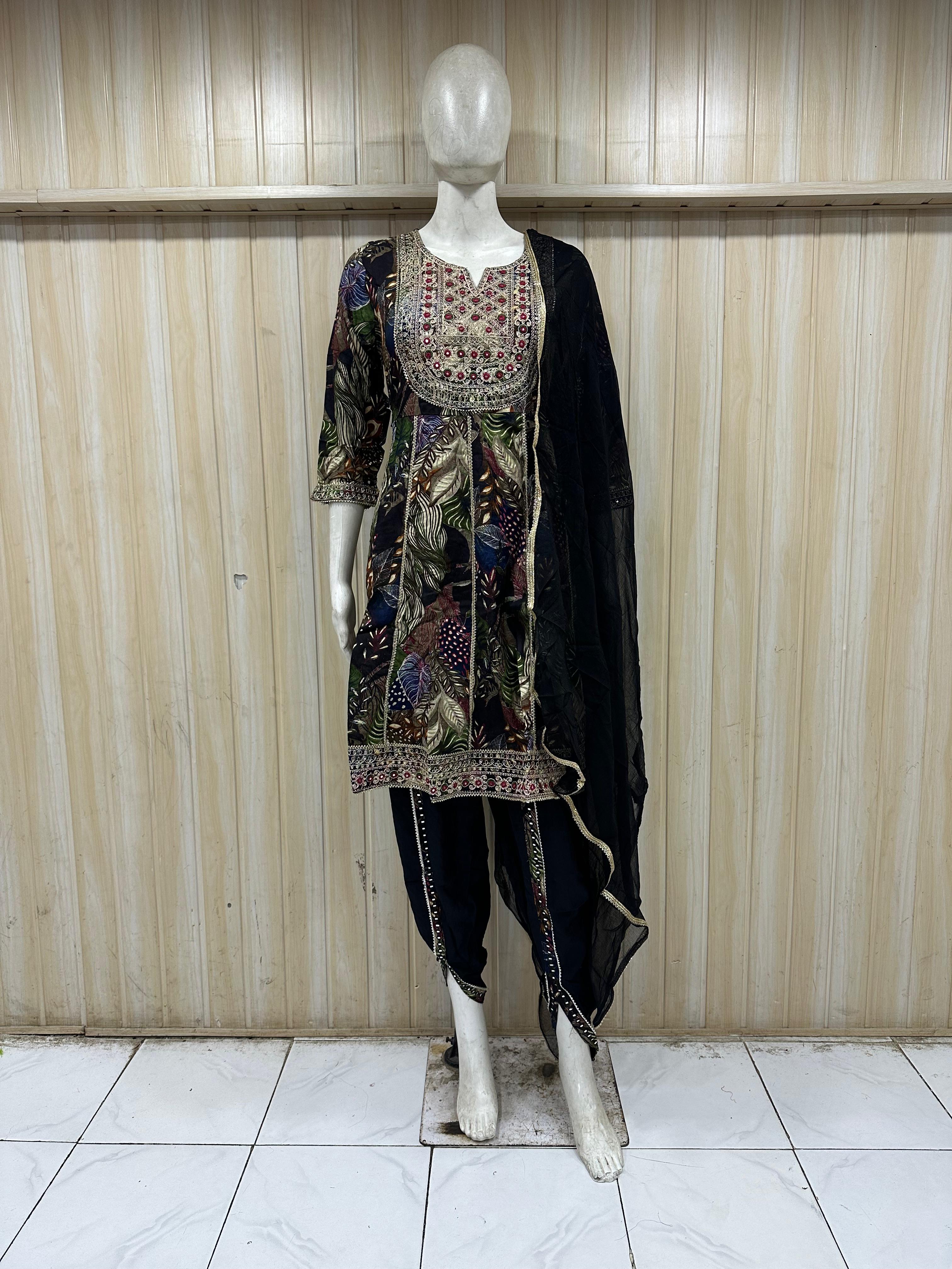 Again, small correction — it’s not grey and not a real model. It’s a dark navy/black printed kurti set on a mannequin with heavy embroidery, giving a rich festive look 🖤✨