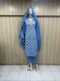mannequin wearing patterned bluetraditional outfit with a matching dupatta against a striped wall