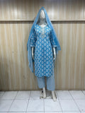 mannequin wearing patterned blue traditional outfit with a matching dupatta against a striped wall