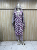 mannequin wearing a purpal patterned traditional outfit with a matching shawl headscraf against a striped wall  ChatGPT3:28 PM