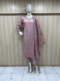 mannequin wearing a pink traditional floral outfit with a matching dupatta shawl headscraf against a striped wall
