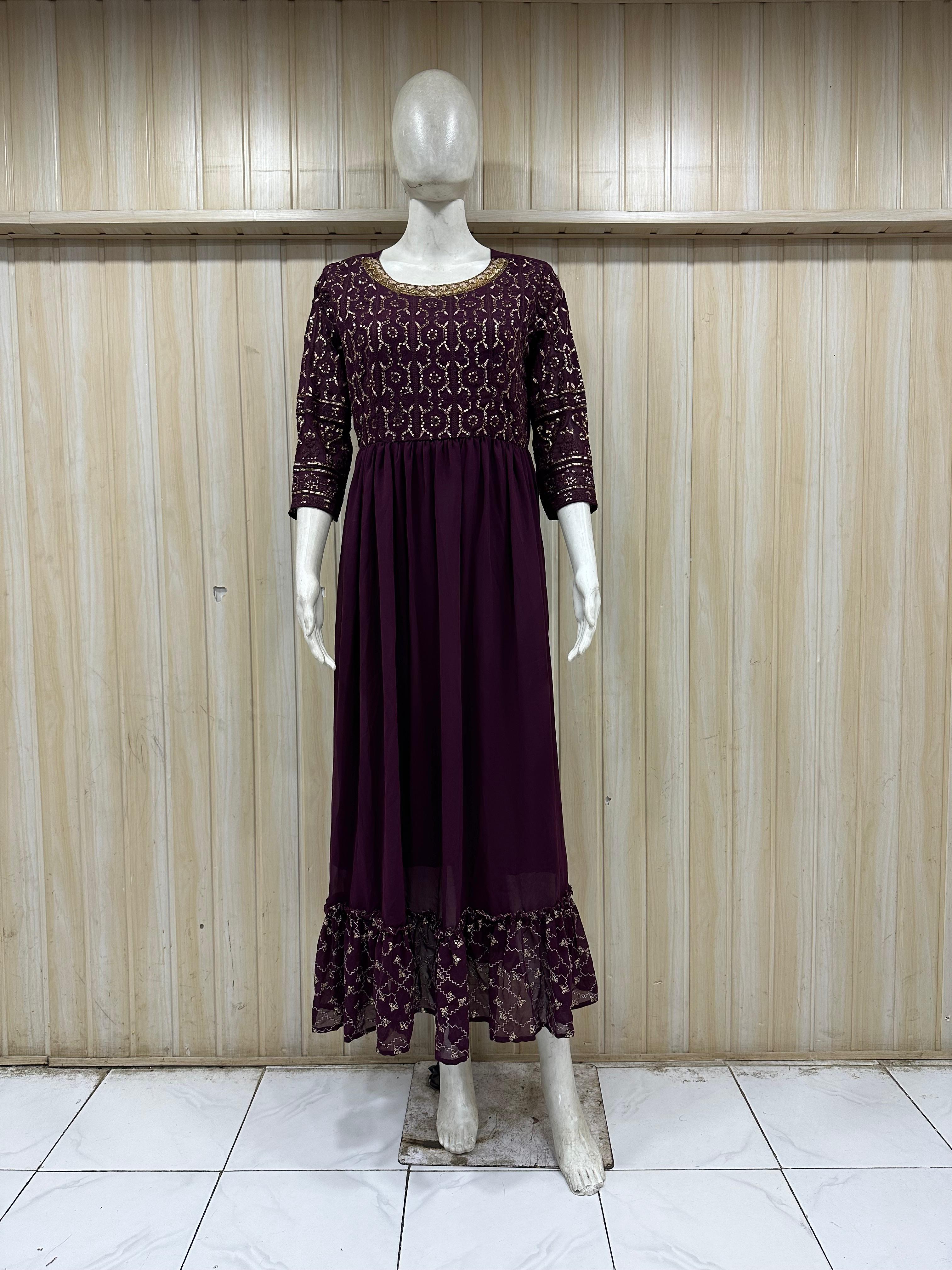mannequin wearing a dark purpal outfit with dress embellishments Floral Traditional against a striped wall