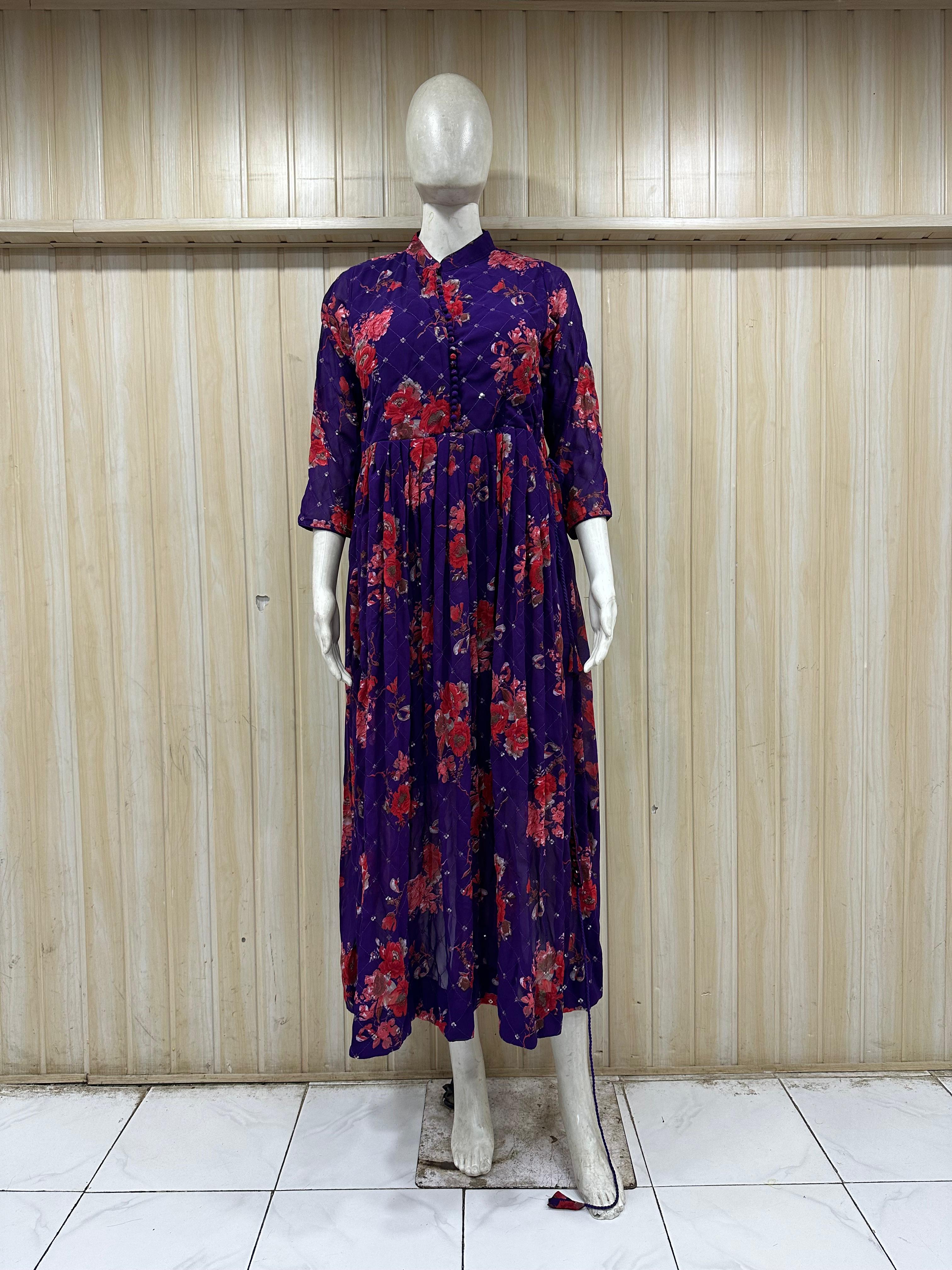 mannequin wearing a purpal dress outfit with colorful dupatta Floral Traditional against a striped wall