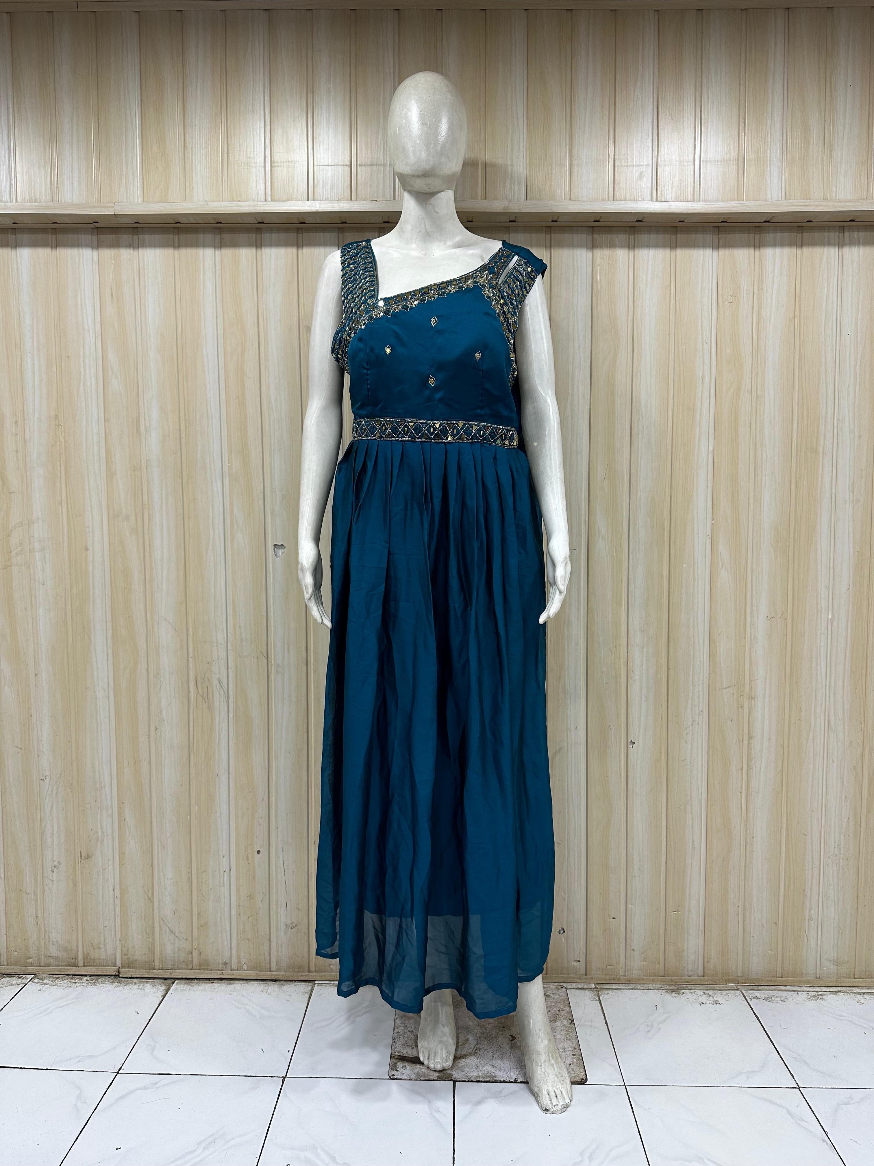 mannequin wearing a black floral dress outfit with  Traditional against a wooden panel background