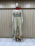 mannequin wearing a cream floral dress outfit with Traditional against a wooden panel background