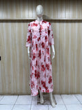 mannequin wearing a white floral dress outfit with Traditional against a wooden panel background
