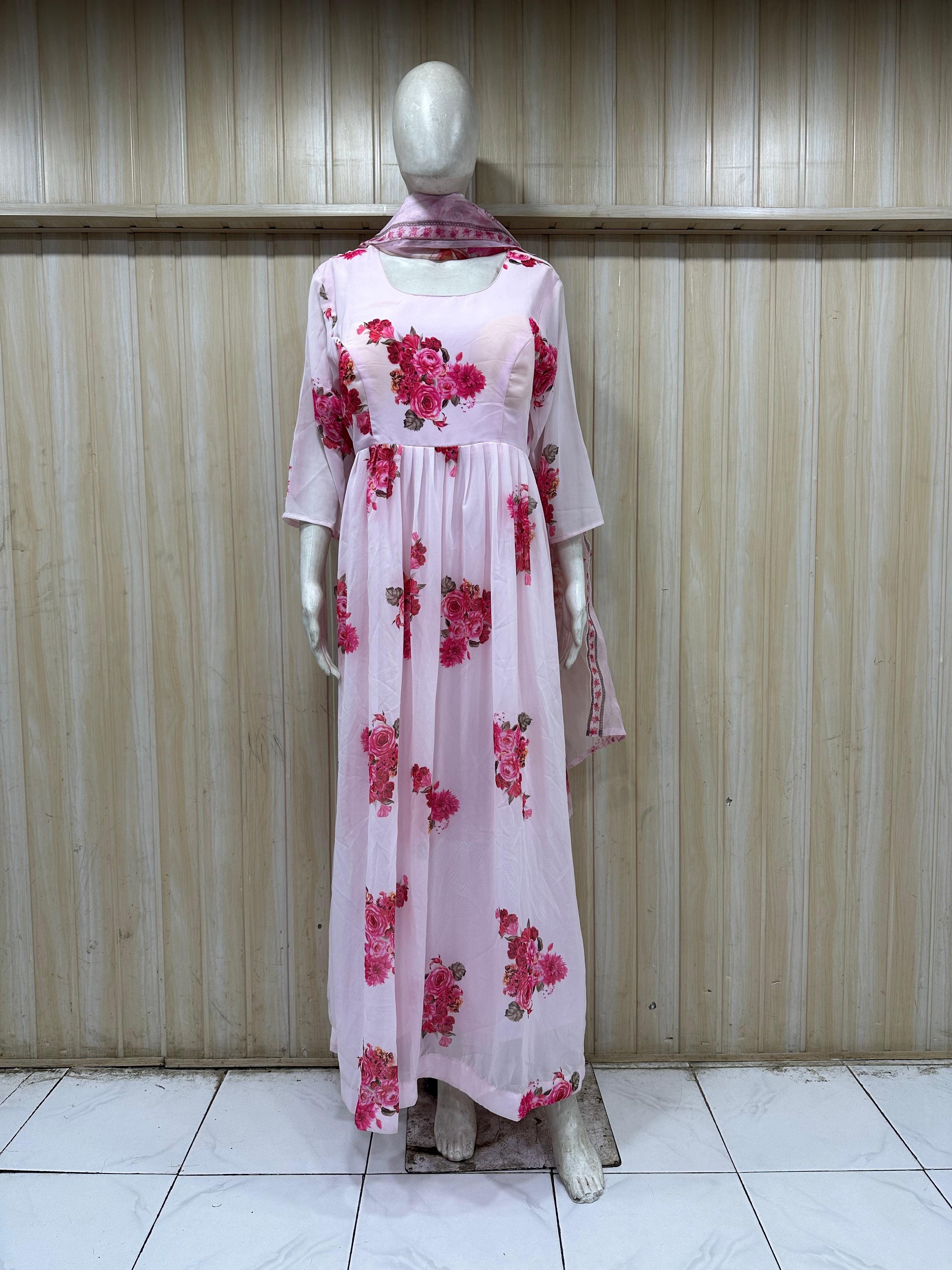 mannequin wearing a white and pink floral dress outfit with Traditional against a wooden panel background