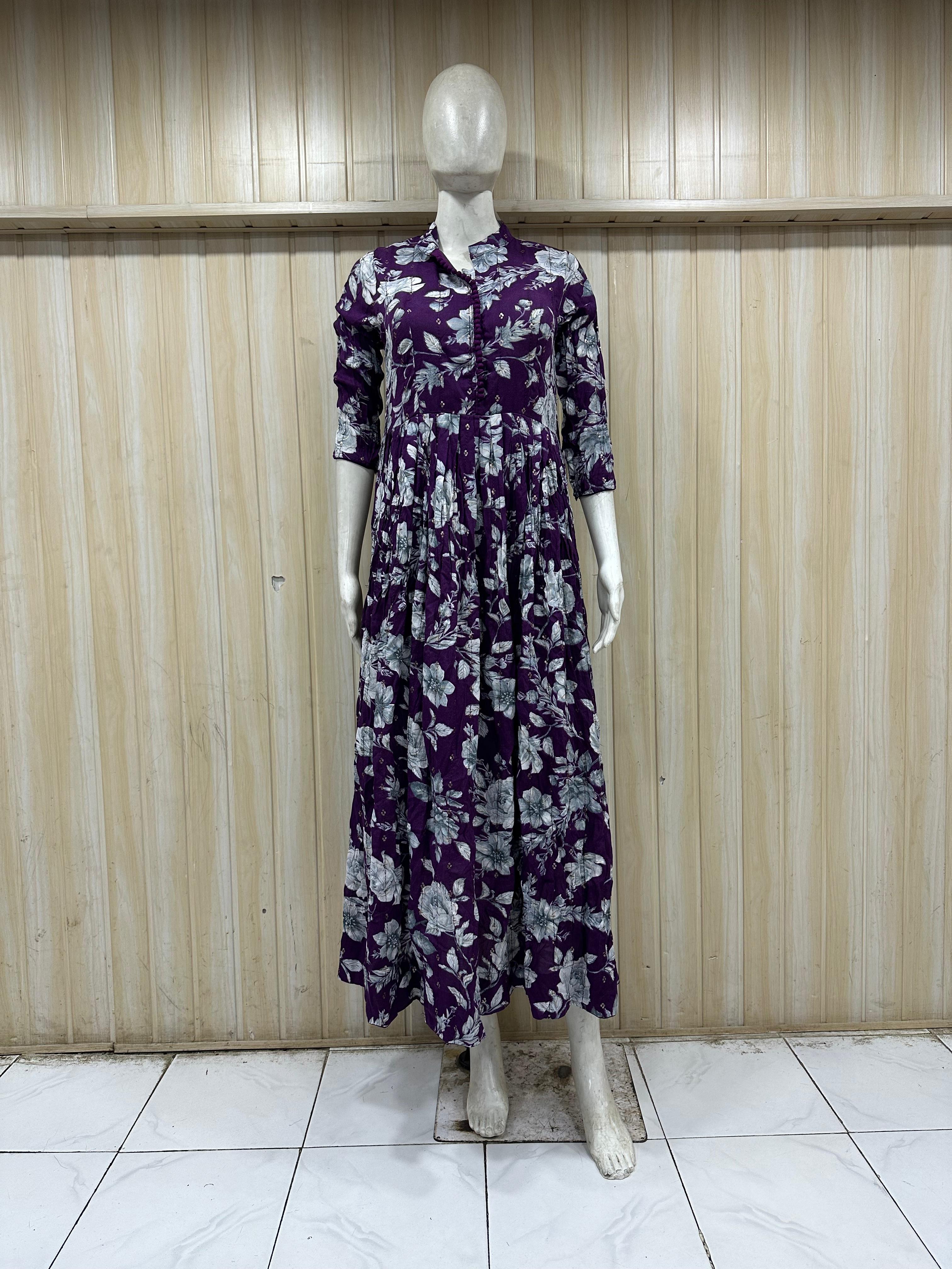 mannequin wearing a purpal and white floral dress outfit with Traditional against a wooden panel background