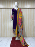 Mannequin wearing a purple dress with a colorful dupatta against a stripe