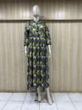 Mannequin wearing a floral dress against a wooden panel background  ChatGPT6:48 PM