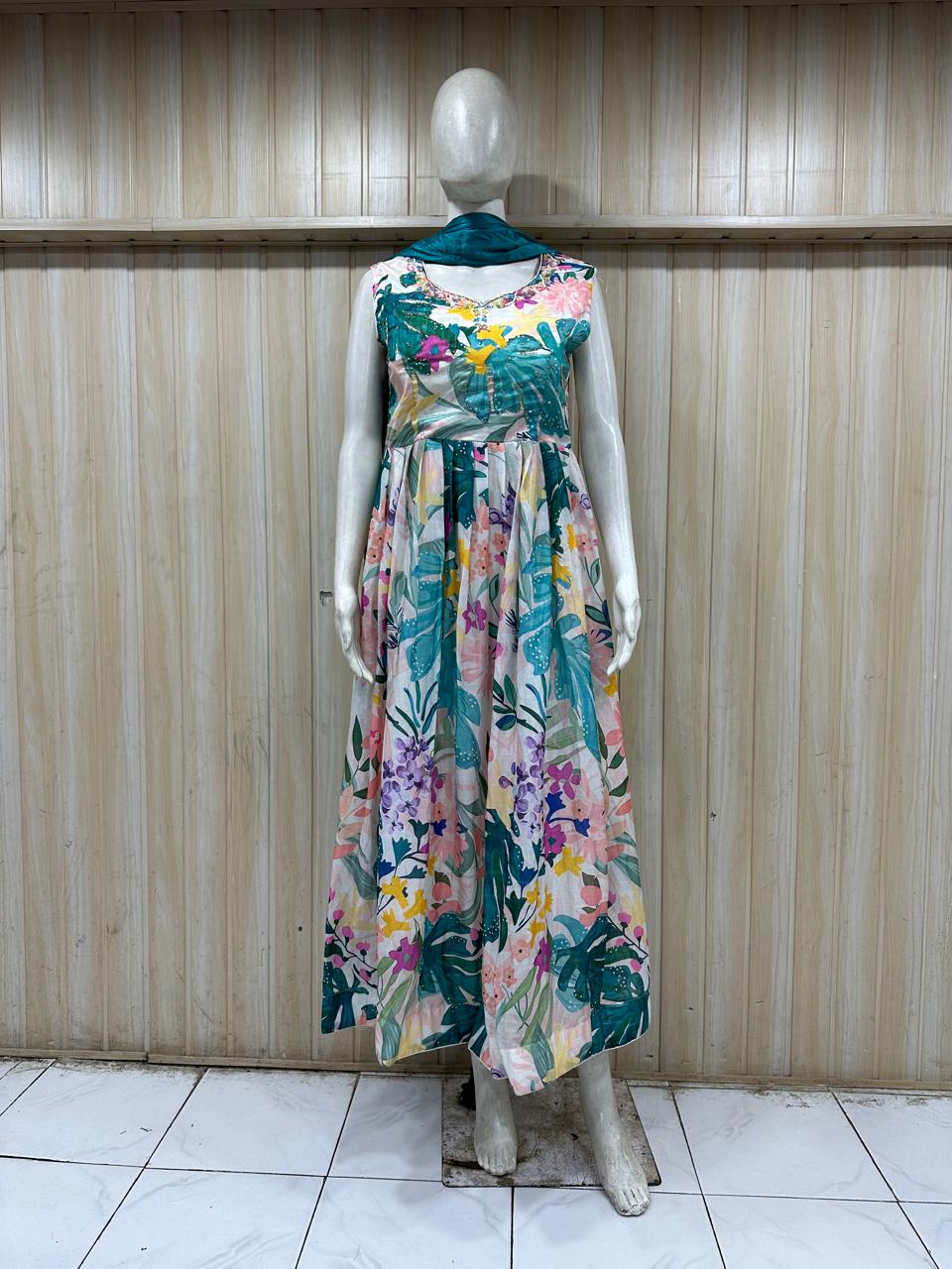 Mannequin wearing a floral dress against a wooden panel background