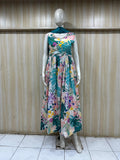 Mannequin wearing a white floral dress with a store interior in the background