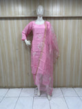 Mannequin wearing a pink traditional outfit with a saree against a striped