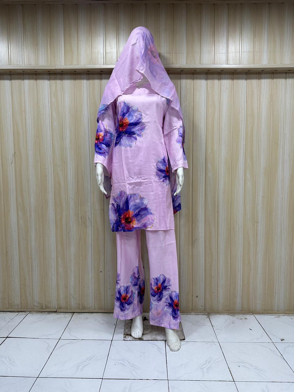 Purple floral outfit on a mannequin against a striped