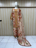 Mannequin wearing a floral dress with a beige background