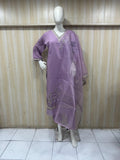 Purple dress with intricate designs on a mannequin against a striped