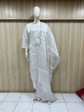 White saree with a mannequin against a striped