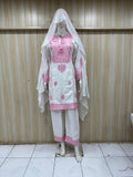 White and pink embroidered traditional outfit with a veil on a mannequin against a striped
