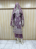 Purple embroidered traditional outfit on a mannequin against a striped