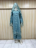 Mannequin wearing a teal dress with lace details against a striped