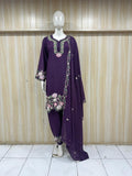 Purple embroidered outfit on a mannequin against a striped
