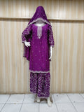 purple embroidered outfit on mannequin against striped