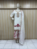 White embroidered outfit with red details on a mannequin against a striped   ChatGPT8:21 PM