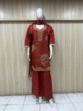 dark oreang traditional outfit with matching dupatta on a mannequin against a striped