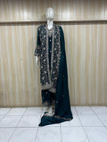 blue traditional outfit with matching dupatta on a mannequin against a striped