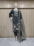 gometry gold traditional outfit with matching dupatta on a mannequin against a striped