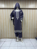 navy blue gold traditional outfit with matching dupatta on a mannequin against a striped