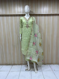 Light green traditional outfit with floral dupatta on a mannequin against a striped