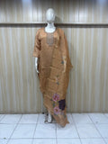beige gold Purple traditional outfit with a dupatta on a mannequin against a striped