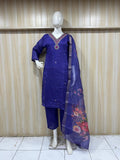 navy blue gold traditional outfit with a dupatta on a mannequin against a striped