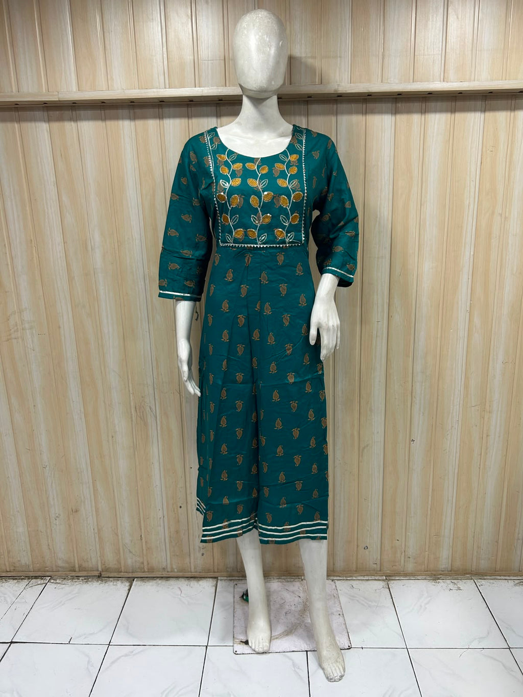 Teal Green Rayon 1-Piece Round Kurti with Embroidered Yoke