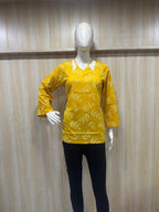 Mustard Yellow Mull Cotton Short Kurti with White Leaf Print & Cut-Out Neckline