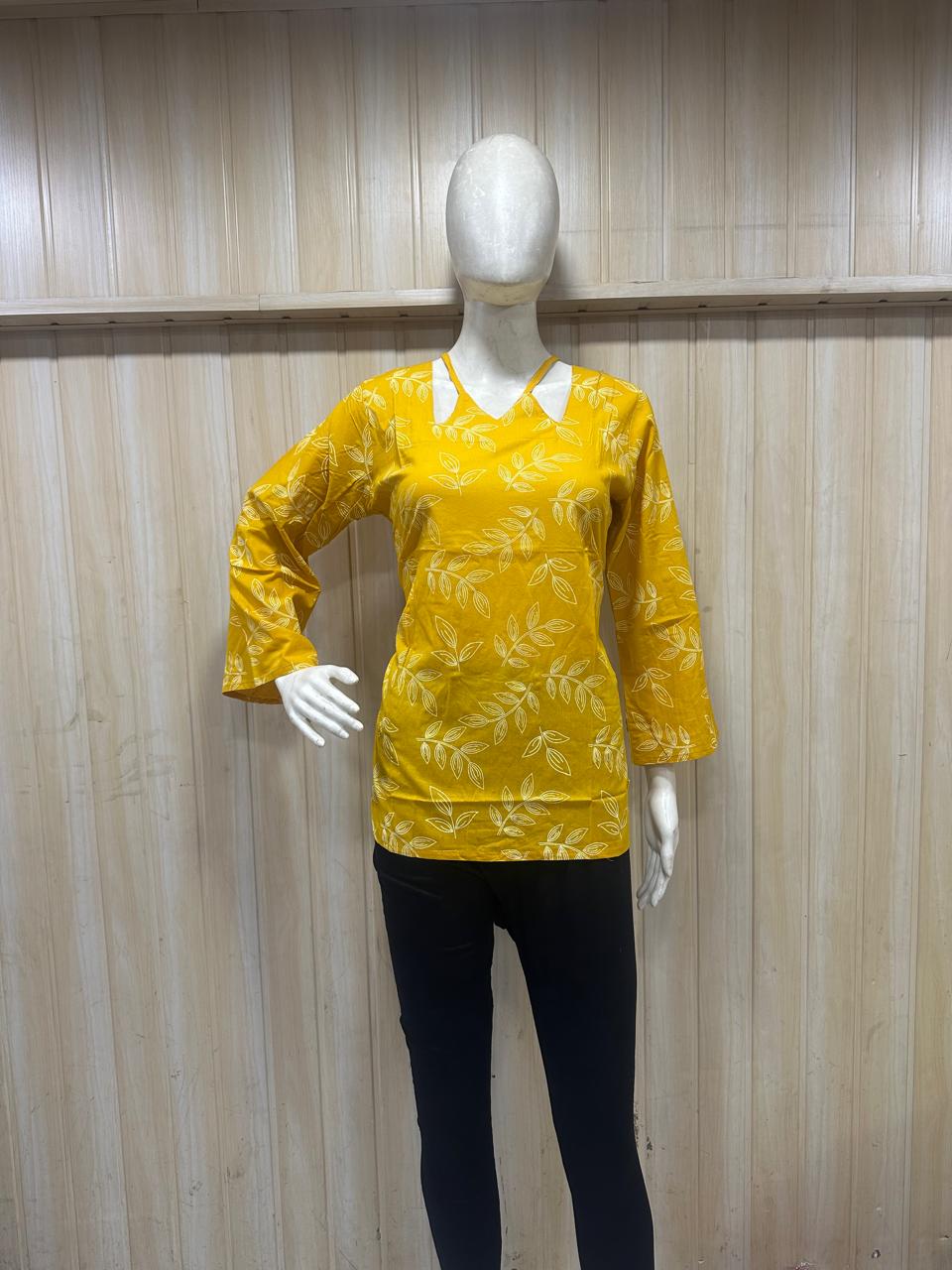 Mustard Yellow Mull Cotton Short Kurti with White Leaf Print & Cut-Out Neckline
