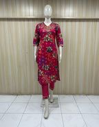This is a high-quality fashion photoshoot image showing a female model wearing a bright pink traditional kurti set. The image looks like it’s made for catalog, eCommerce, or brand promotion.